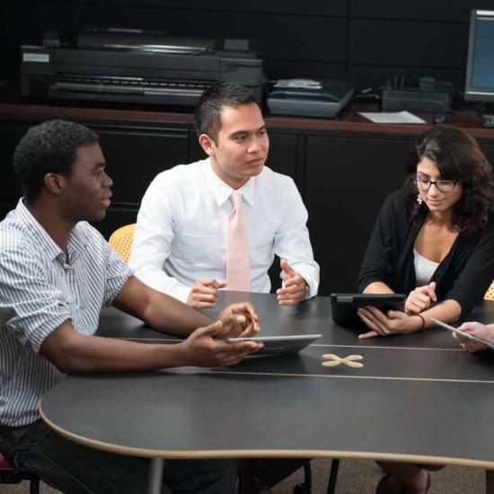 Three student discussing an idea